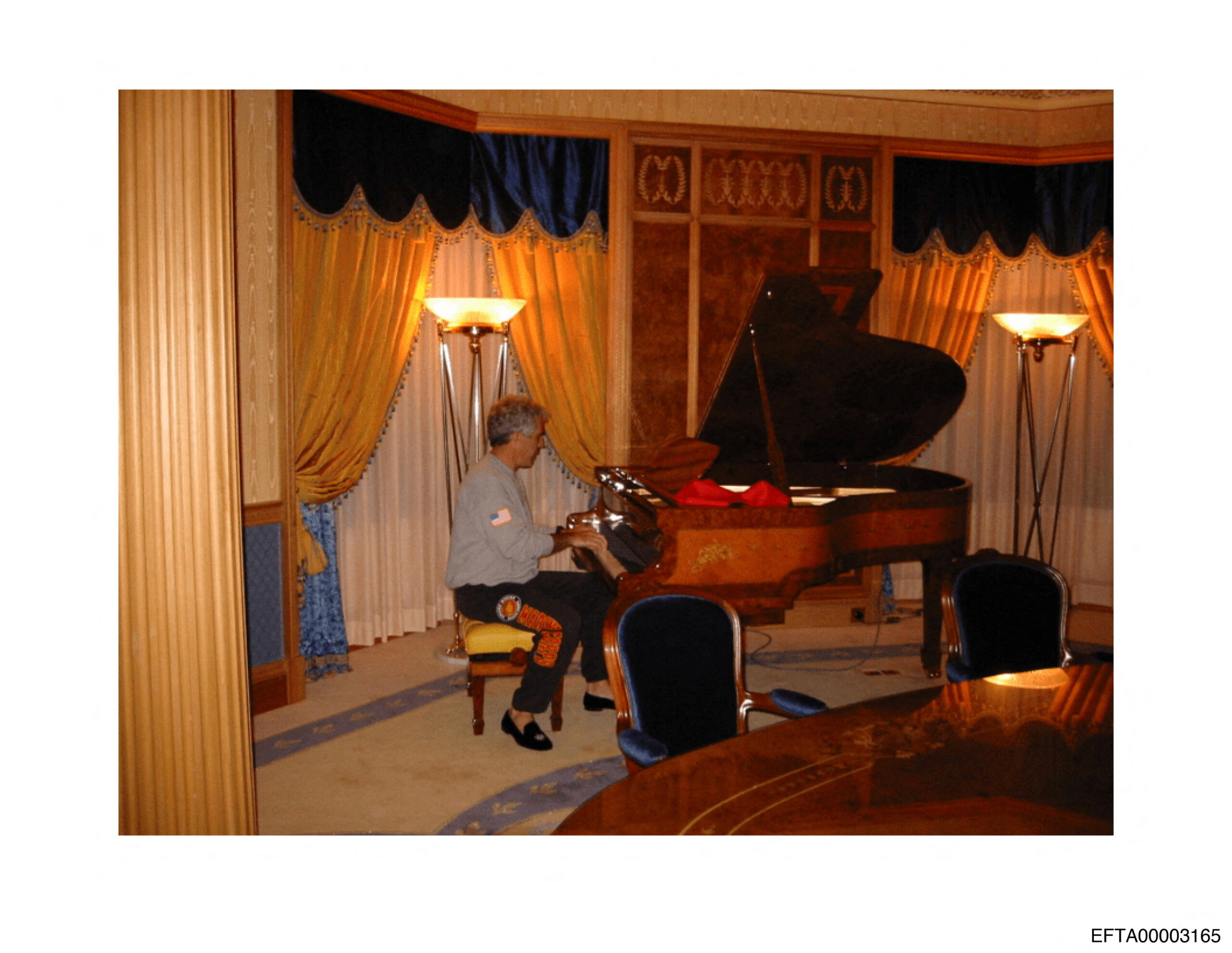 Jeffrey Epstein plays the piano in this image from the estate of late financier and convicted sex offender Jeffrey Epstein, released by the Department of Justice in Washington, D.C., U.S., on December 19, 2025. U.S. Justice Department