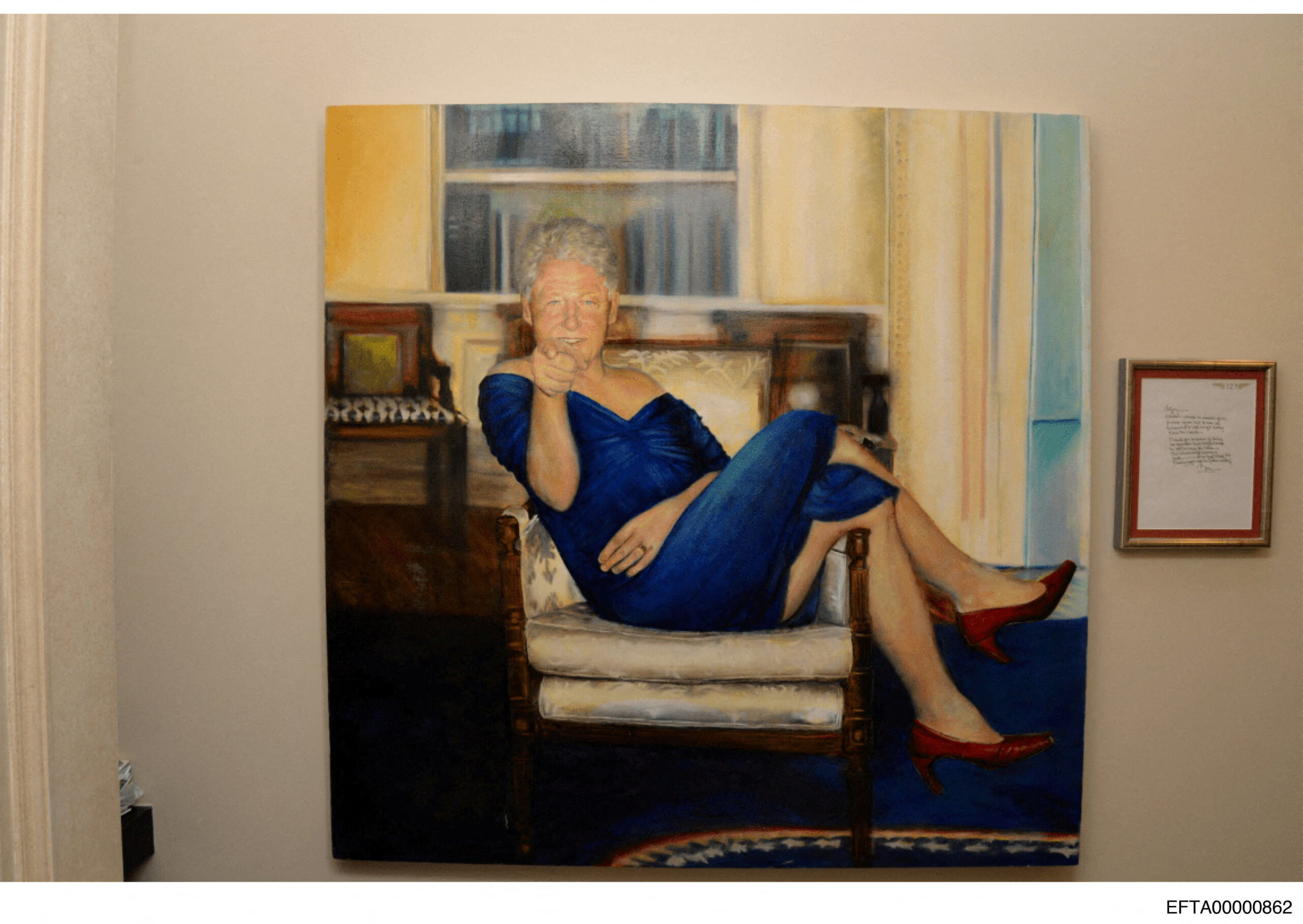 A painting of former U.S. President Bill Clinton wearing a dress is displayed inside the Manhattan home of Jeffrey Epstein in this image from the estate of late financier and convicted sex offender Jeffrey Epstein, released by the Department of Justice in Washington, D.C., U.S., on December 19, 2025. U.S. Justice Department