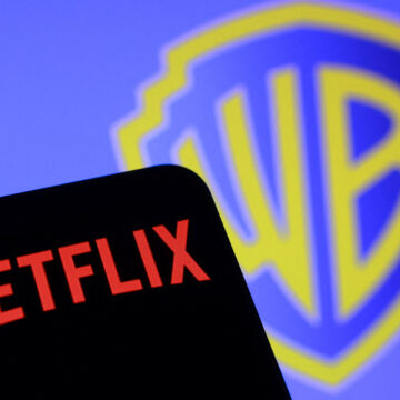 Netflix and Warner Bros logos are seen in this illustration