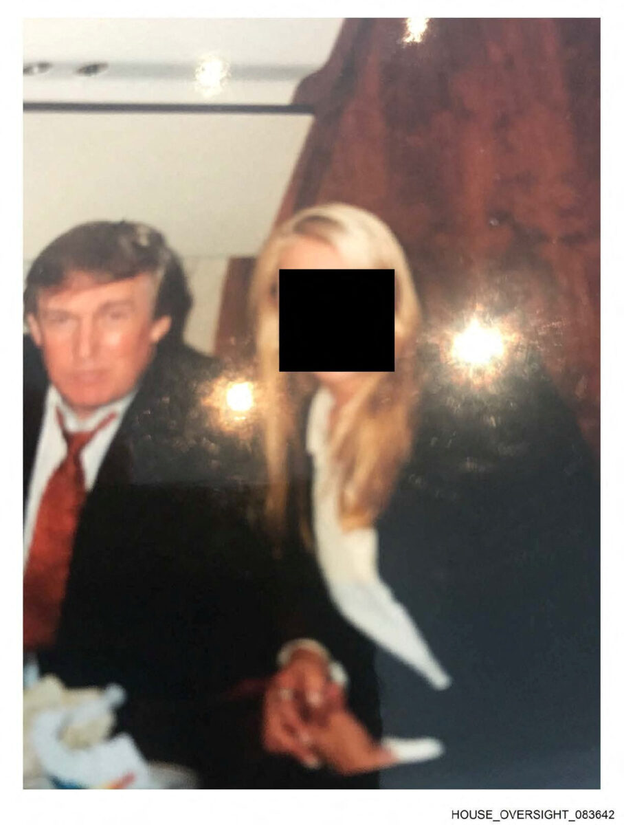 U.S. President Donald Trump is seen with an unidentified woman in this handout image from the estate of the late financier and convicted sex offender Jeffrey Epstein, released by Democrats on the House Oversight Committee in Washington, D.C., U.S., on December 12, 2025. House Oversight Committee Democrats