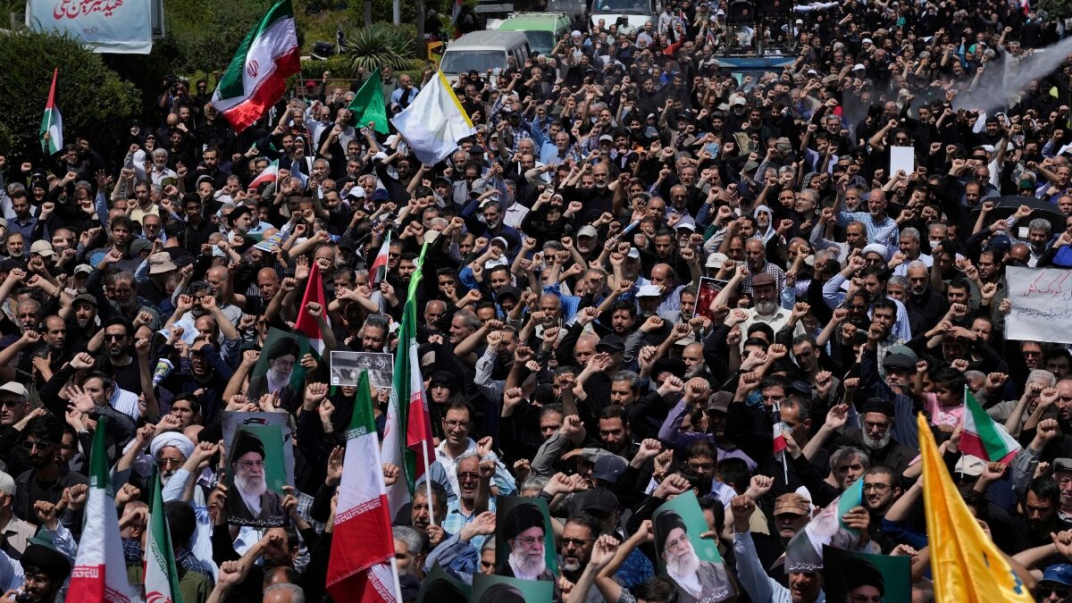 Iranian worshippers chant slogans in an anti-U.S. and anti-Israeli protest after their Friday prayers in Tehran, Iran, Friday, July 25, 2025.