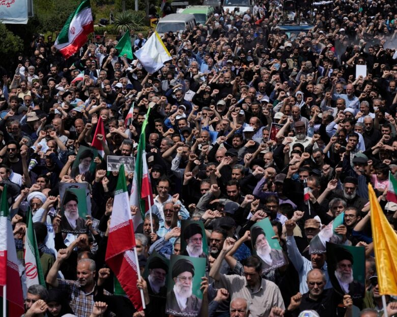 Iranian worshippers chant slogans in an anti-U.S. and anti-Israeli protest after their Friday prayers in Tehran, Iran, Friday, July 25, 2025.