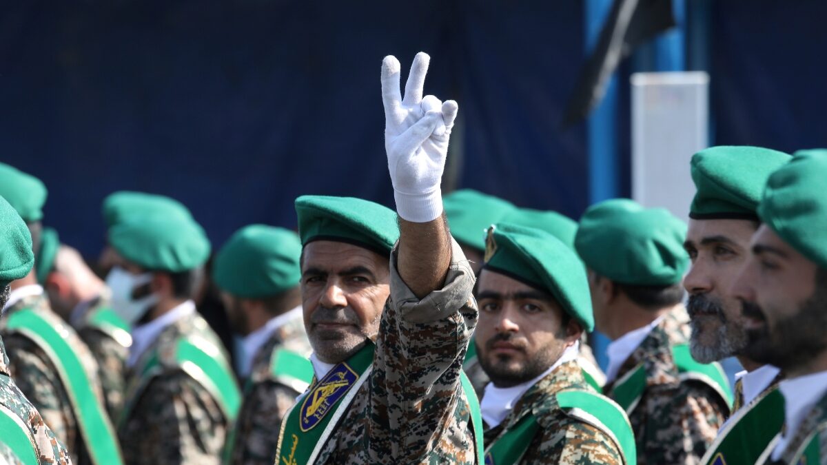 FILE - A member of Iran's paramilitary force flashes a victory sign during a military parade outside of Tehran, Iran, on Sept. 22, 2022