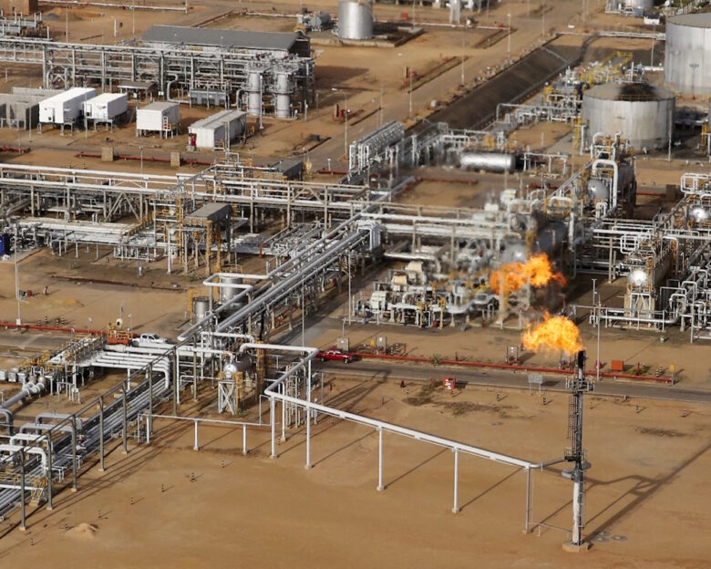 FILE PHOTO: A flame burning natural gas is seen at an heavy-crude treatment plant operated by Venezuela's state oil company PDVSA, in the oil rich Orinoco belt, near Cabrutica at the state of Anzoategui April 16, 2015. Picture taken on April 16, 2015