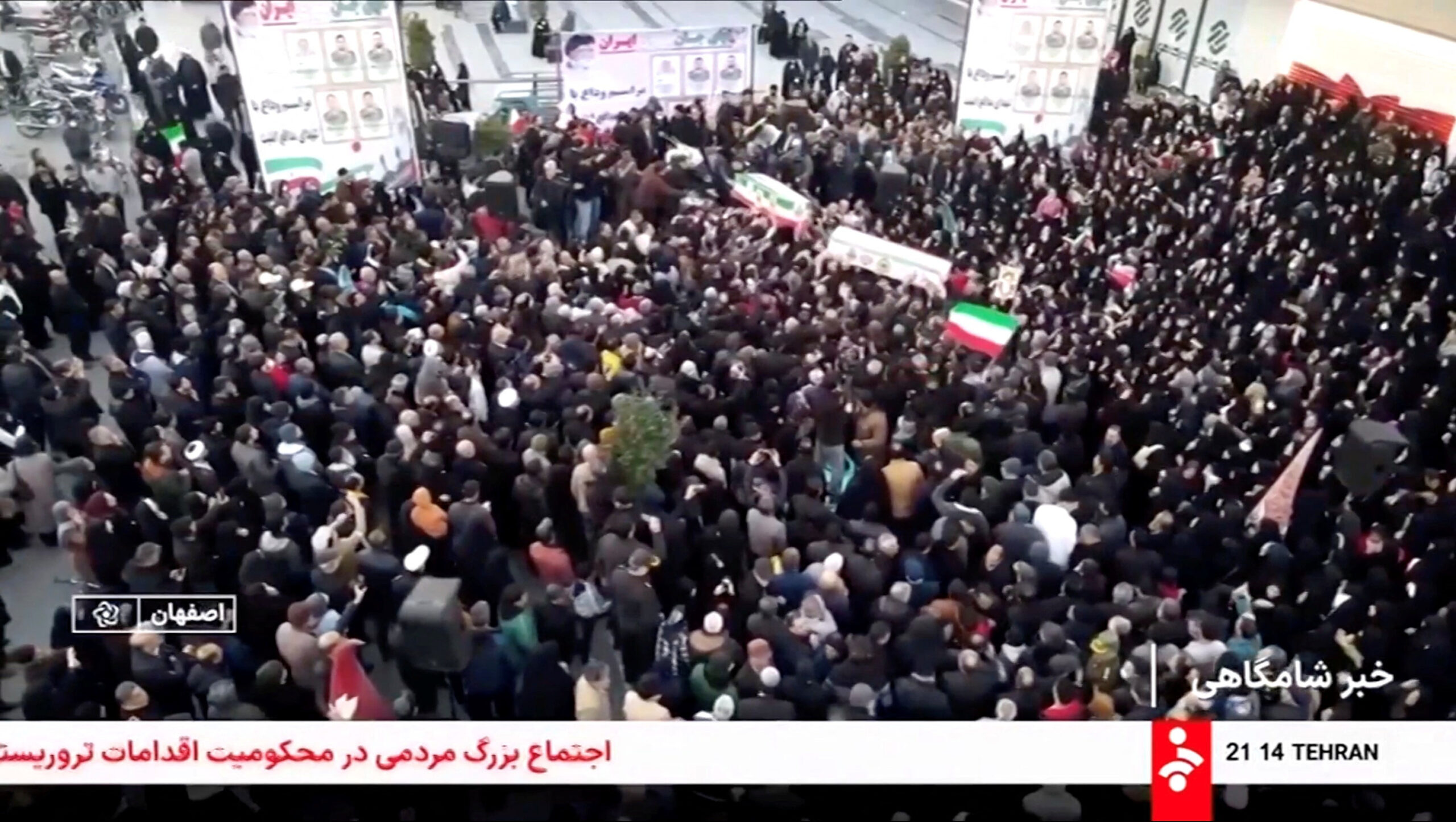 Mourners carry coffins during a funeral procession for members of security forces and civilians said to be killed in protests on Sunday, amid evolving anti-government unrest, in Tehran, Iran, in this screengrab from a video released on January 11, 2026.  IRIB