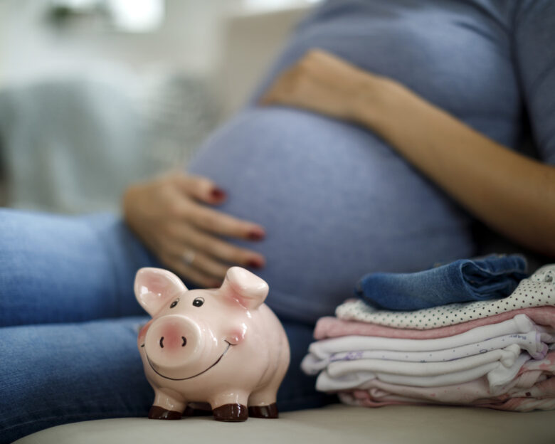 Pregnant woman saving up for baby
