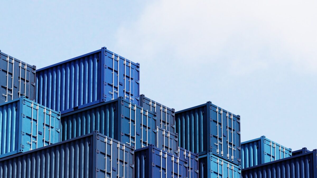 Stack of blue container boxes with sky background. Cargo freight shipping for import and export logistics. Business and transportation concept. 3D illustration rendering