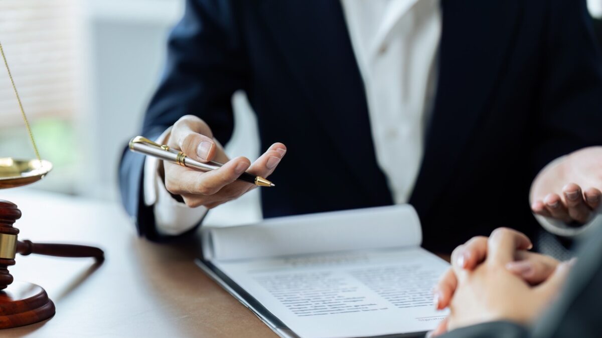 Client was listening to a lawyer advising, explaining the details of the proceeding.