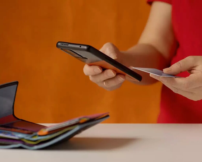 Woman uses modern devices in everyday life: in online shopping, checking a bank account, receiving messages, transferring money.