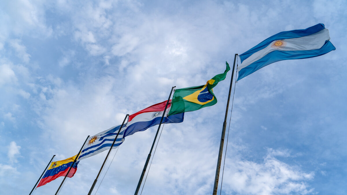 Mercosur flags flying high. Several flagpoles with Mercosur flags. Latin American flags. South American flags.