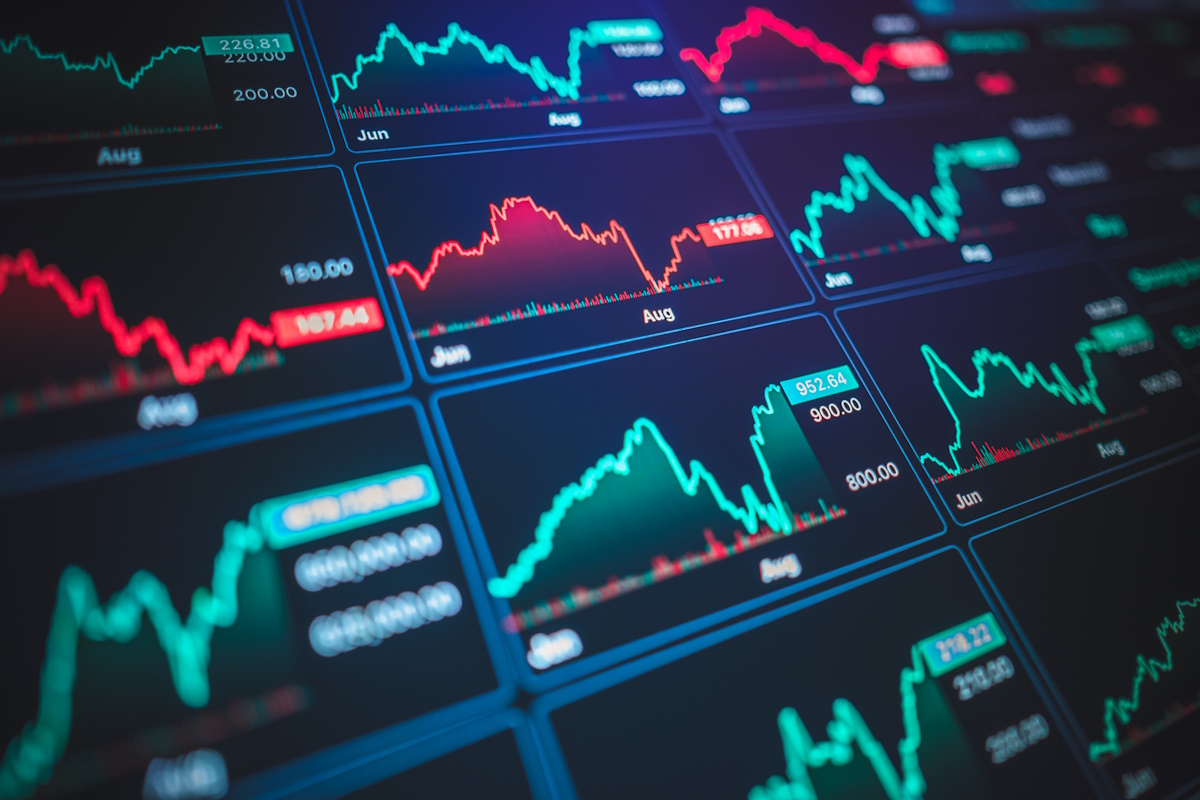 Digital financial dashboard with multiple red candlestick charts representing bearish momentum and economic distress. stock market drop, financial technology, bearish trends, AI investment tools, crisis investing, and digital economy.