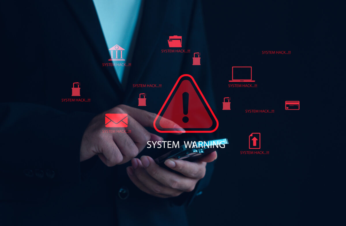 Cyber attack alert and system hacking warning concept with red danger symbols and data breach icons on smartphone, representing online security risk, malware infection, cybercrime threat prevention.