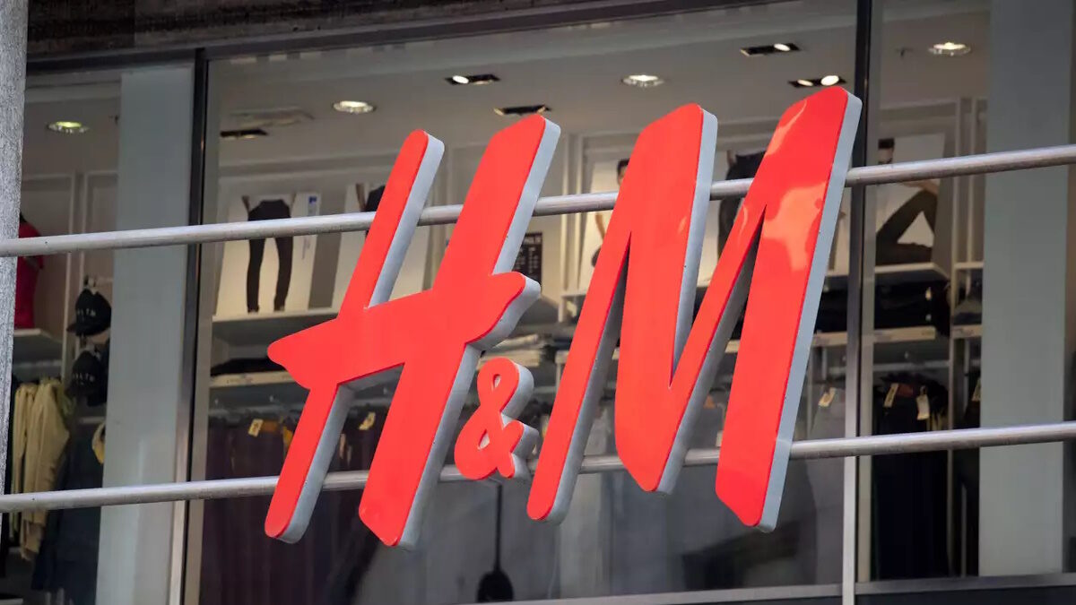 Close up of the logo for the H&M store in Milan, Italy. H&M is a Swedish clothing company with over 2,200 stores worldwide.