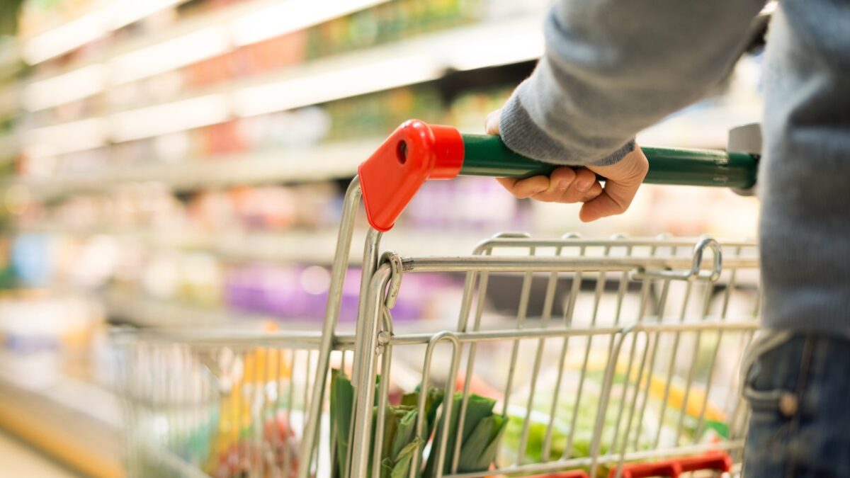 Close-up detail of a man shopping in a supermarket