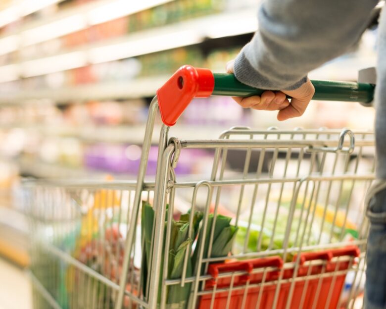 Close-up detail of a man shopping in a supermarket