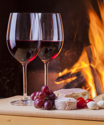 food and drinks at cozy fireplace at home