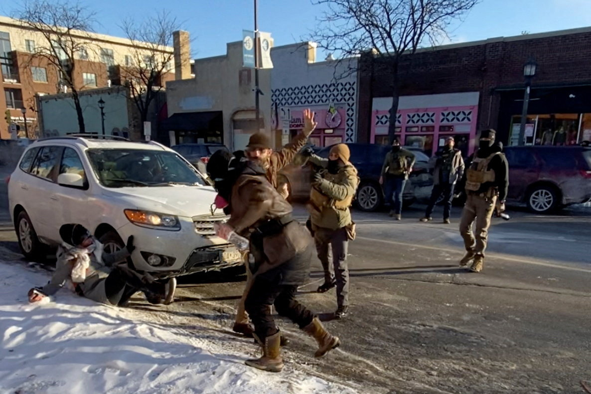 A screengrab from a video obtained by Reuters shows a law enforcement officer spraying irritants at a man identified as Alex Pretti, before he was fatally shot when federal agents were trying to detain him in Minneapolis, Minnesota, U.S., January 24, 2026. VIDEO OBTAINED BY REUTERS