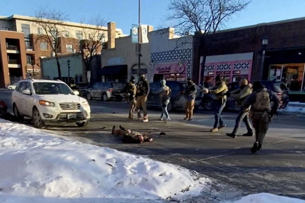 SENSITIVE MATERIAL. THIS IMAGE MAY OFFEND OR DISTURB A screengrab from a video obtained by Reuters shows a federal agent shooting at a man identified as Alex Pretti, as he lies on the ground in Minneapolis, Minnesota, U.S., January 24, 2026. VIDEO OBTAINED BY REUTERS