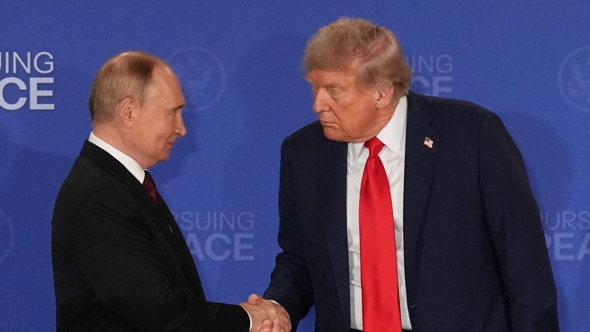 FILE - President Donald Trump, right, shakes the hand of Russia's President Vladimir Putin during a joint press conference at Joint Base Elmendorf-Richardson, Alaska, Aug. 15, 2025. (AP Photo/Jae C. Hong, File)