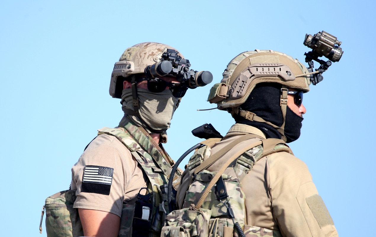 A U.S. Navy SEAL special forces operator (left) stands with a colleague during a joint U.S.-Cyprus military drill involving the re-taking of a ship hijacked by terrorists at Limassol port on Friday, September 10, 2021. Cyprus’ Defense Minister Charalambos Petrides said the U.S. and Cyprus are on the same strategic path to ensure security and stability in a turbulent region and that continued close cooperation between the special forces of both countries aim to counter threats from potential terrorist acts