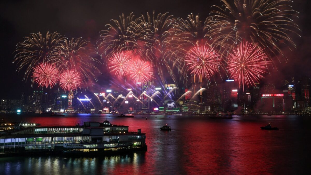 Fireworks go off over the Victoria Harbour on the second day of the Lunar Year of the Horse, in Hong Kong, China February 18, 2026. REUTERS/Tyrone Siu