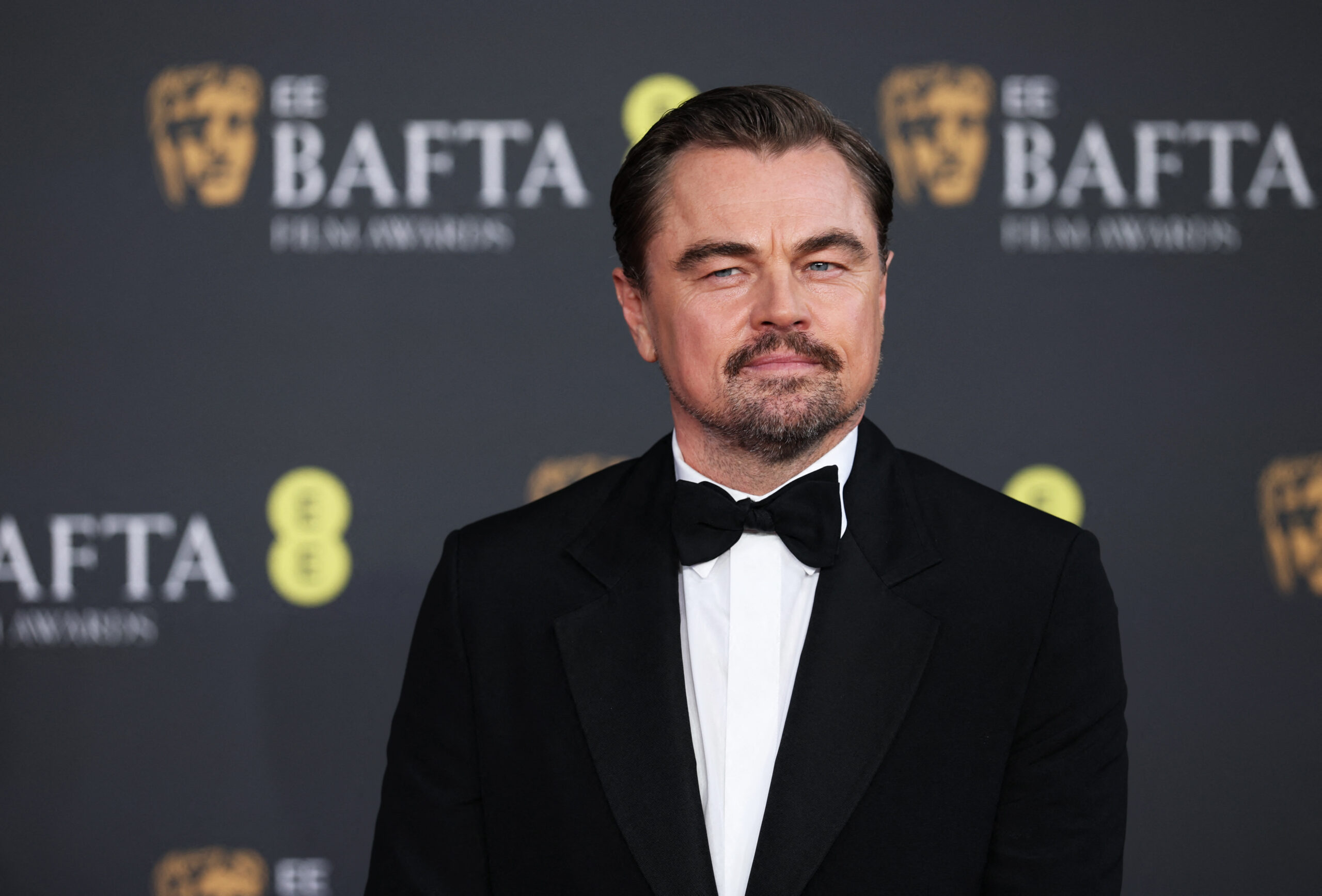 Leonardo DiCaprio poses on the red carpet during the 2026 British Academy of Film and Television Awards (BAFTA) at the Royal Festival Hall in the Southbank Centre, London, Britain, February 22, 2026. REUTERS