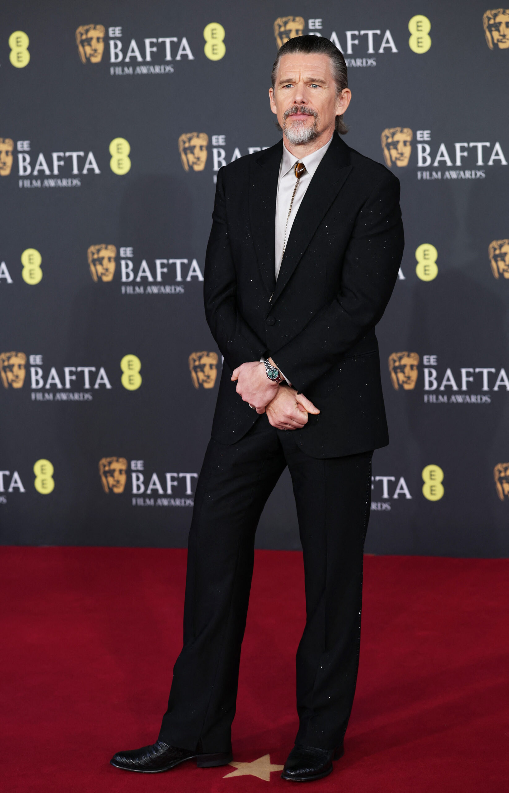Ethan Hawke poses on the red carpet during the 2026 British Academy of Film and Television Awards (BAFTA) at the Royal Festival Hall in the Southbank Centre, London, Britain, February 22, 2026. REUTERS
