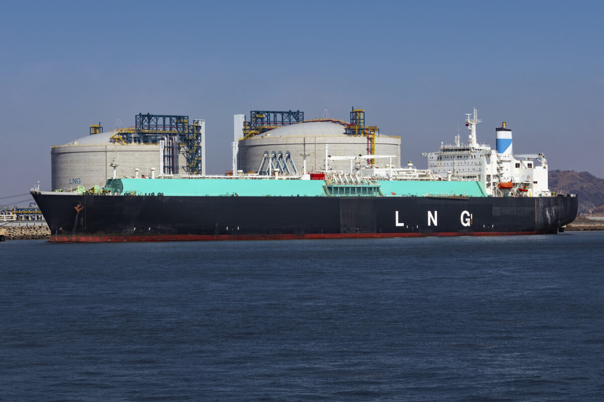 LNG (Liquefied natural gas) tanker ship unloading its cargo at LNG terminal