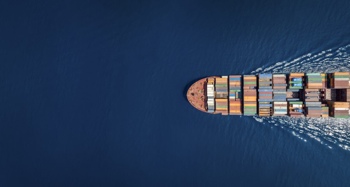 Aerial top down view of a large container cargo ship with copy space stock photo