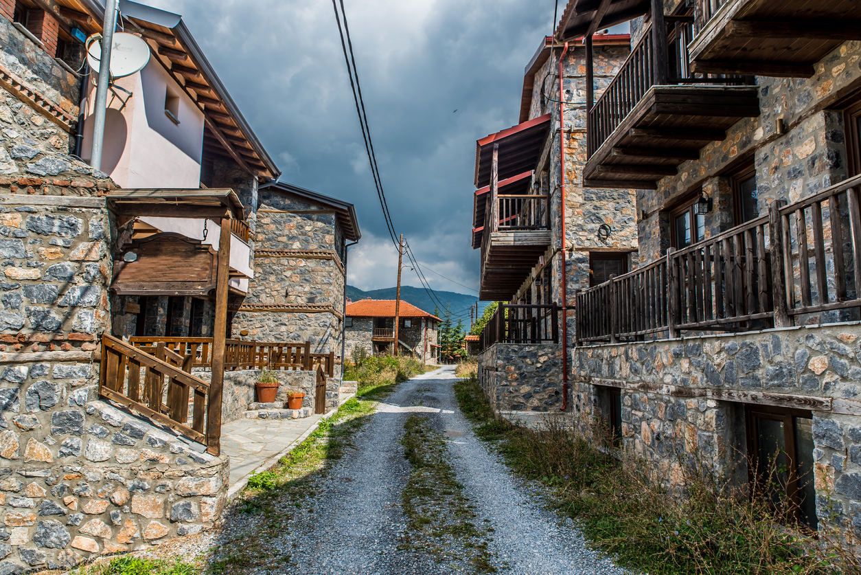 Traditional alley at Agios Athanasios village in Macedonia Greece near the snow center of Kaimaktsalan
