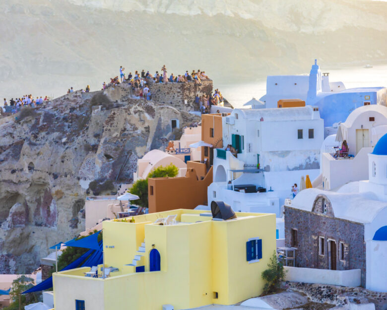 view of stucco buildings in Fira Village, Santorini in Thera, Greece
