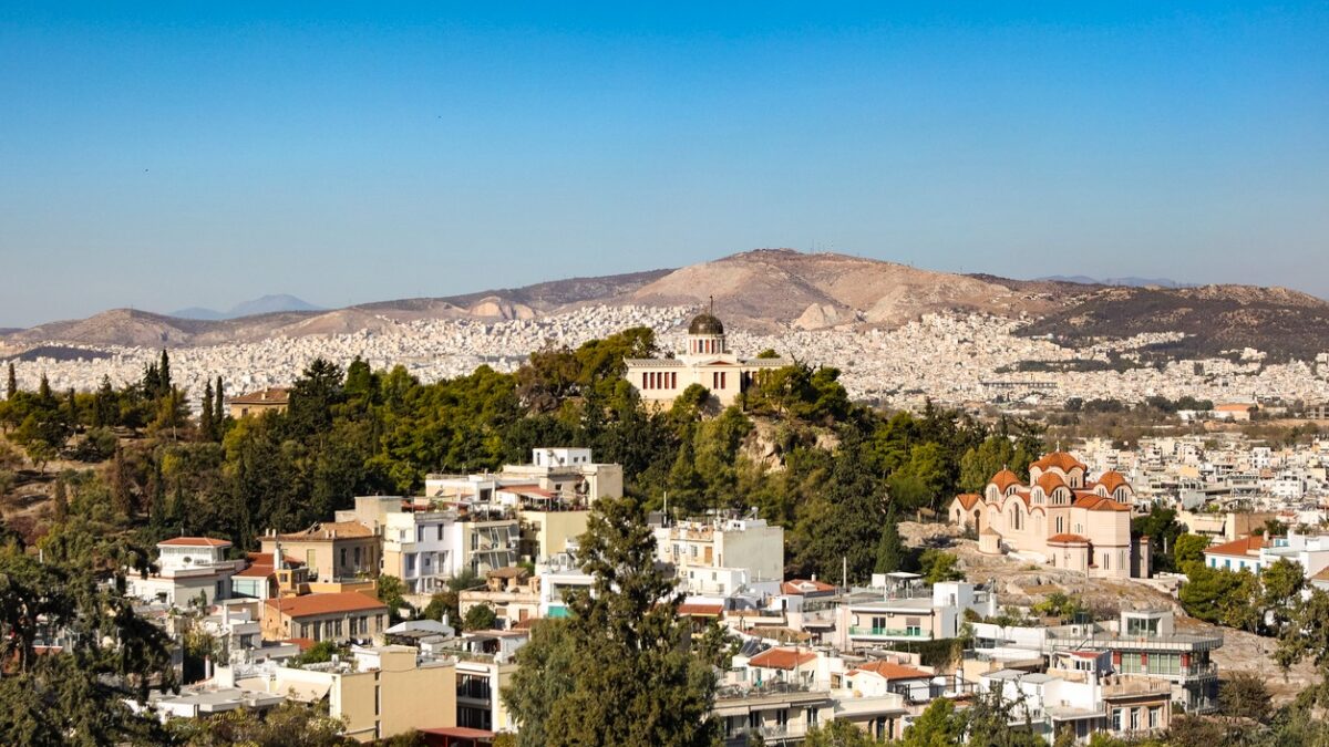 High angle view of National Observatory of Athens (Thissio Visitor Center) and Church of Agia Marina in Athens, Greece