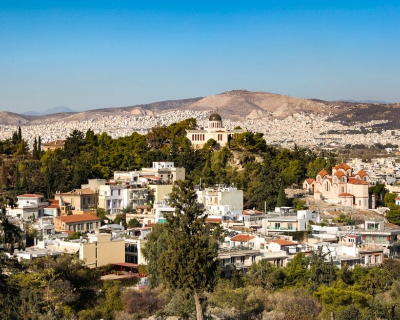 High angle view of National Observatory of Athens (Thissio Visitor Center) and Church of Agia Marina in Athens, Greece.
