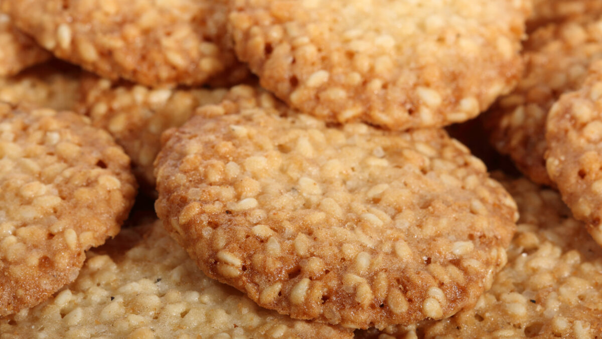 Round cookies with sesame seeds. Food background