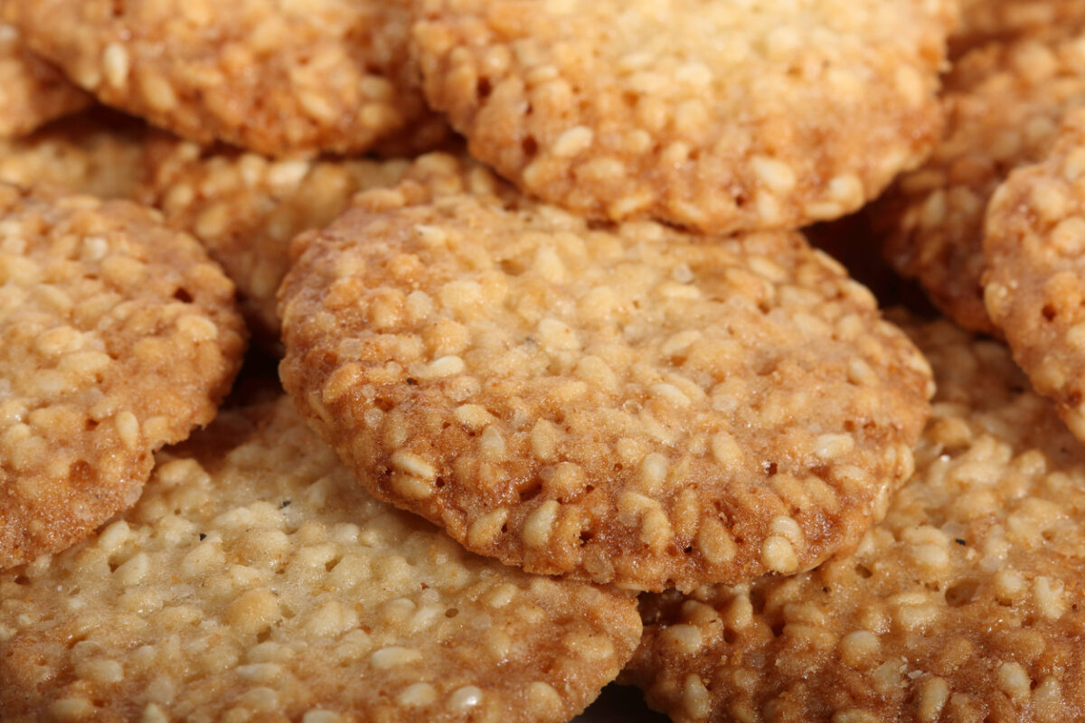 Round cookies with sesame seeds. Food background