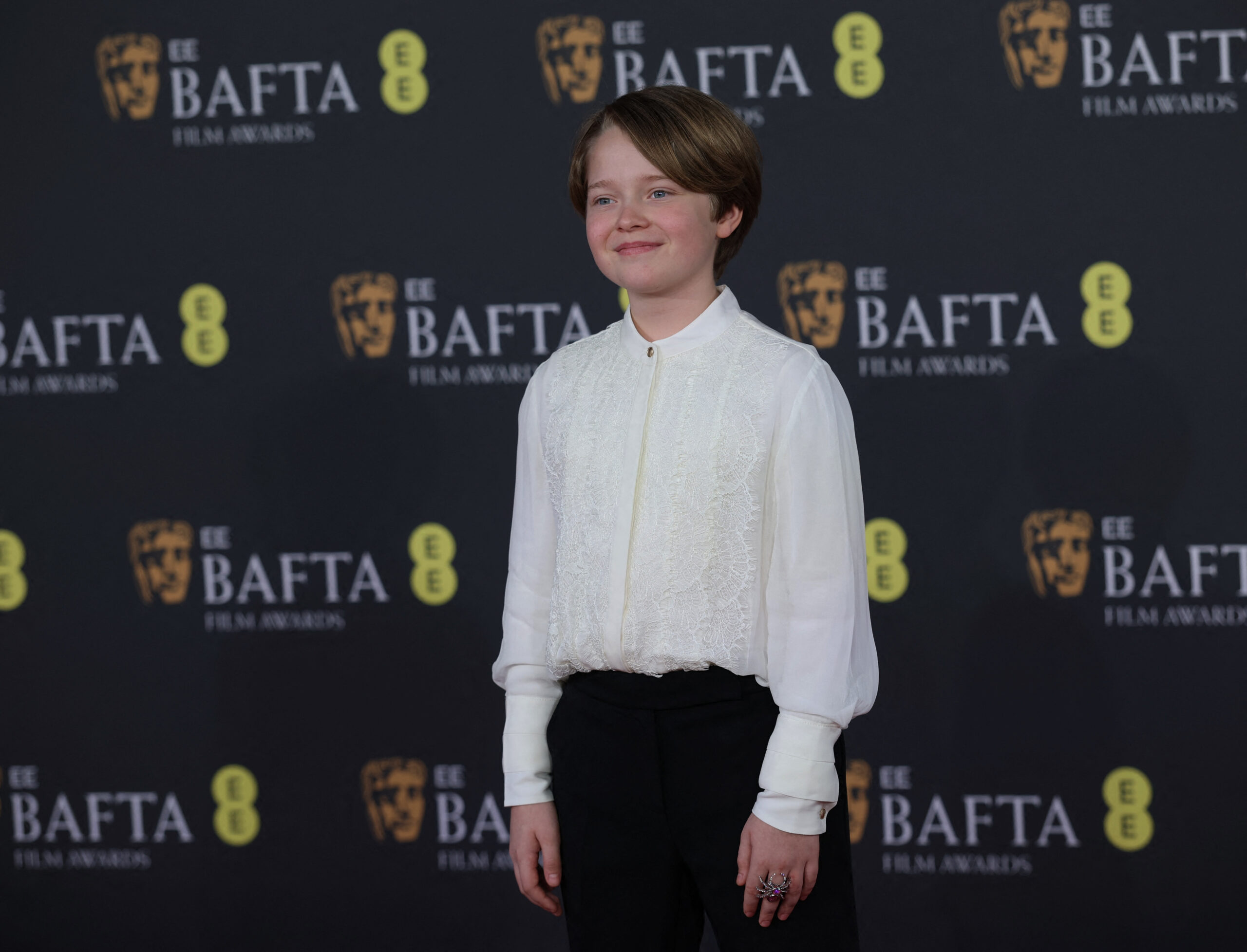 Jacobi Jupe poses on the red carpet during the 2026 British Academy of Film and Television Awards (BAFTA) at the Royal Festival Hall in the Southbank Centre, London, Britain, February 22, 2026. REUTERS