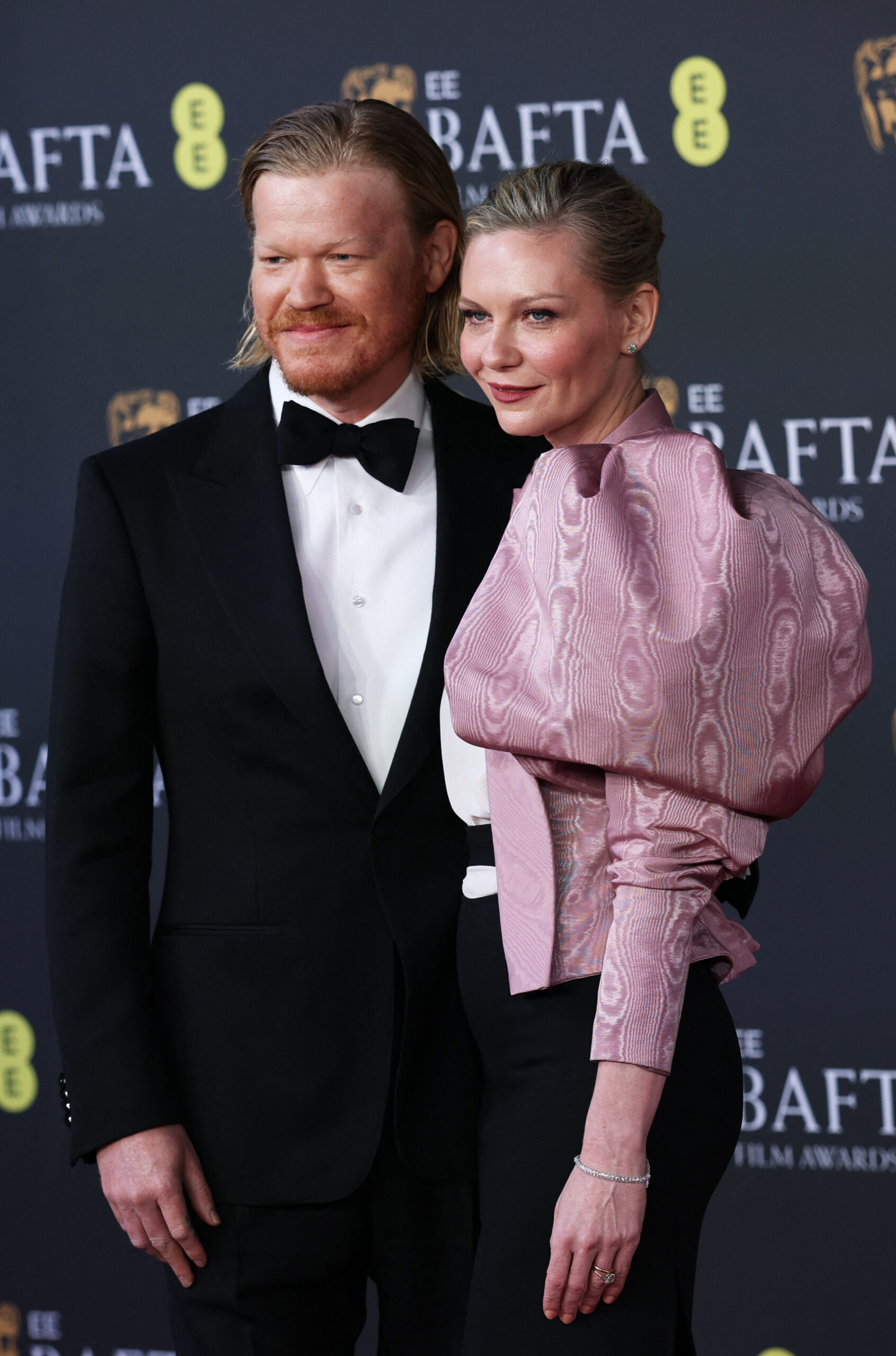 Jesse Plemons and Kirsten Dunst pose on the red carpet during the 2026 British Academy of Film and Television Awards (BAFTA) at the Royal Festival Hall in the Southbank Centre, London, Britain, February 22, 2026. REUTERS