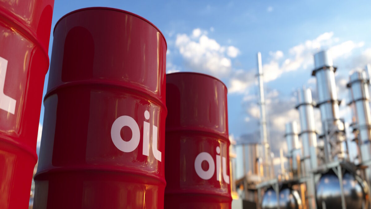 Red oil barrels at a large crude oil plant panoramic at sunset 3d render