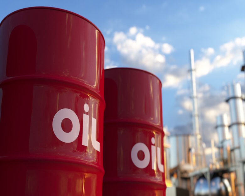Red oil barrels at a large crude oil plant panoramic at sunset 3d render