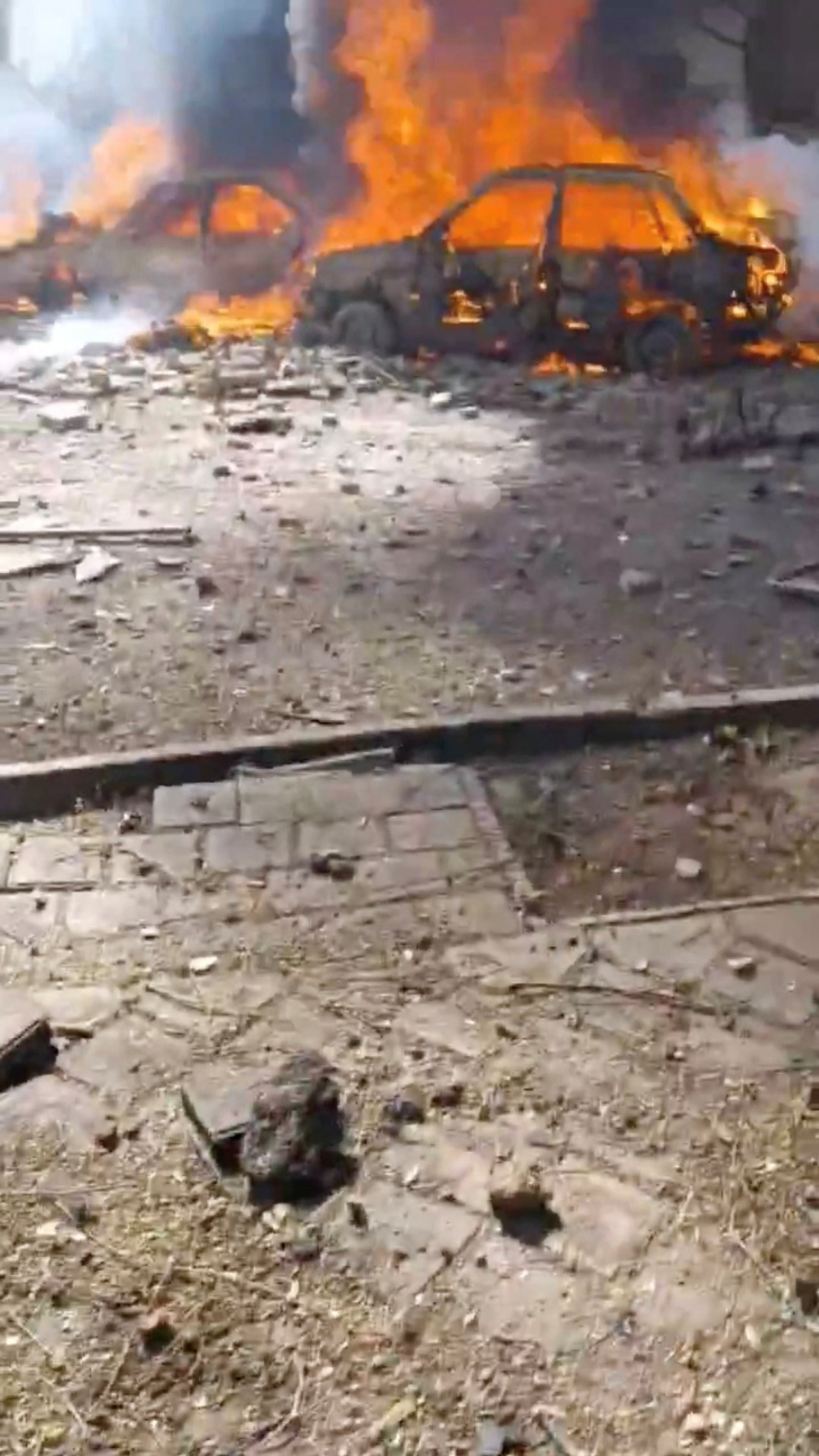 Aftermath of strike in Tehran Vehicles burn in Tehran, Iran, in this screengrab obtained from social media video released on February 28, 2026. Israel and the U.S. conducted strikes on Iran on Saturday. Social Media/via REUTERS THIS IMAGE HAS BEEN SUPPLIED BY A THIRD PARTY. MANDATORY CREDIT. NO RESALES. NO ARCHIVES. NEWS USE ONLY. Verification: Reuters confirmed the location of the videos as Tehran from the buildings, numbered sign, road layout and curb which matched file and satellite imagery of the area. Reuters was not able to verify the exact time when the videos were filmed.