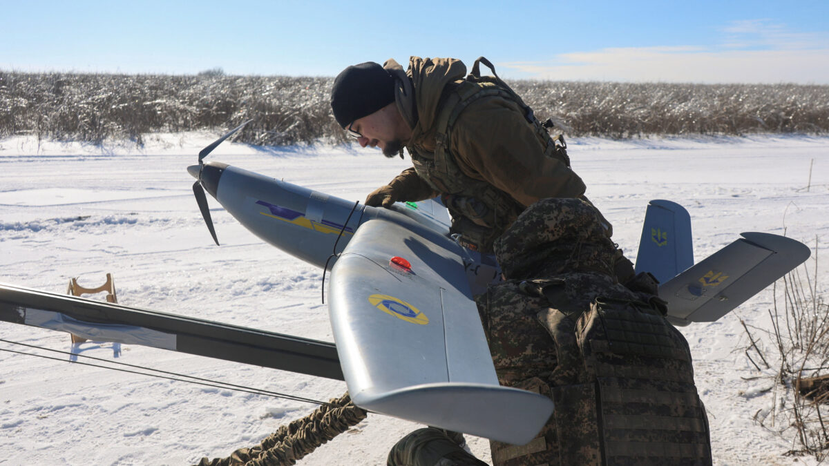Members of the Special purposes UAV unit of the National Guard of Ukraine prepare a reconnaissance drone before launching it to fly over Russian position at a front line, amid Russia's attack on Ukraine, in Kharkiv Region, Ukraine February 22, 2026. REUTERS/Vyacheslav Madiyevskyy