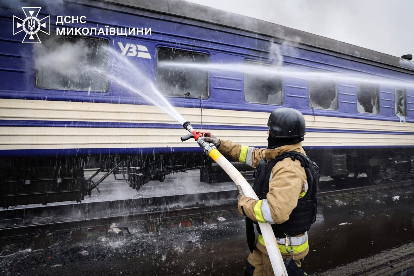 A firefighter works in a passenger train after it was hit by a Russian drone strike, amid Russia's attack on Ukraine, at a railway station in Mykolaiv region, Ukraine March 4, 2026. Press service of the State Emergency Service of Ukraine in Mykolaiv region/Handout via REUTERS ATTENTION EDITORS - THIS IMAGE HAS BEEN SUPPLIED BY A THIRD PARTY. DO NOT OBSCURE LOGO.