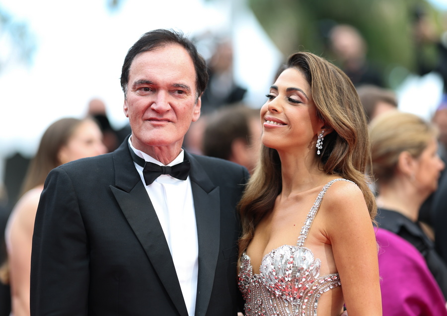 epa12096928 Quentin Tarantino and Daniella Pick attend the 'Partir Un Jour (Leave One Day)' screening and opening ceremony of the 78th annual Cannes Film Festival, in Cannes, France, 13 May 2025. The film festival runs from 13 to 24 May 2025. EPA/MOHAMMED BADRA