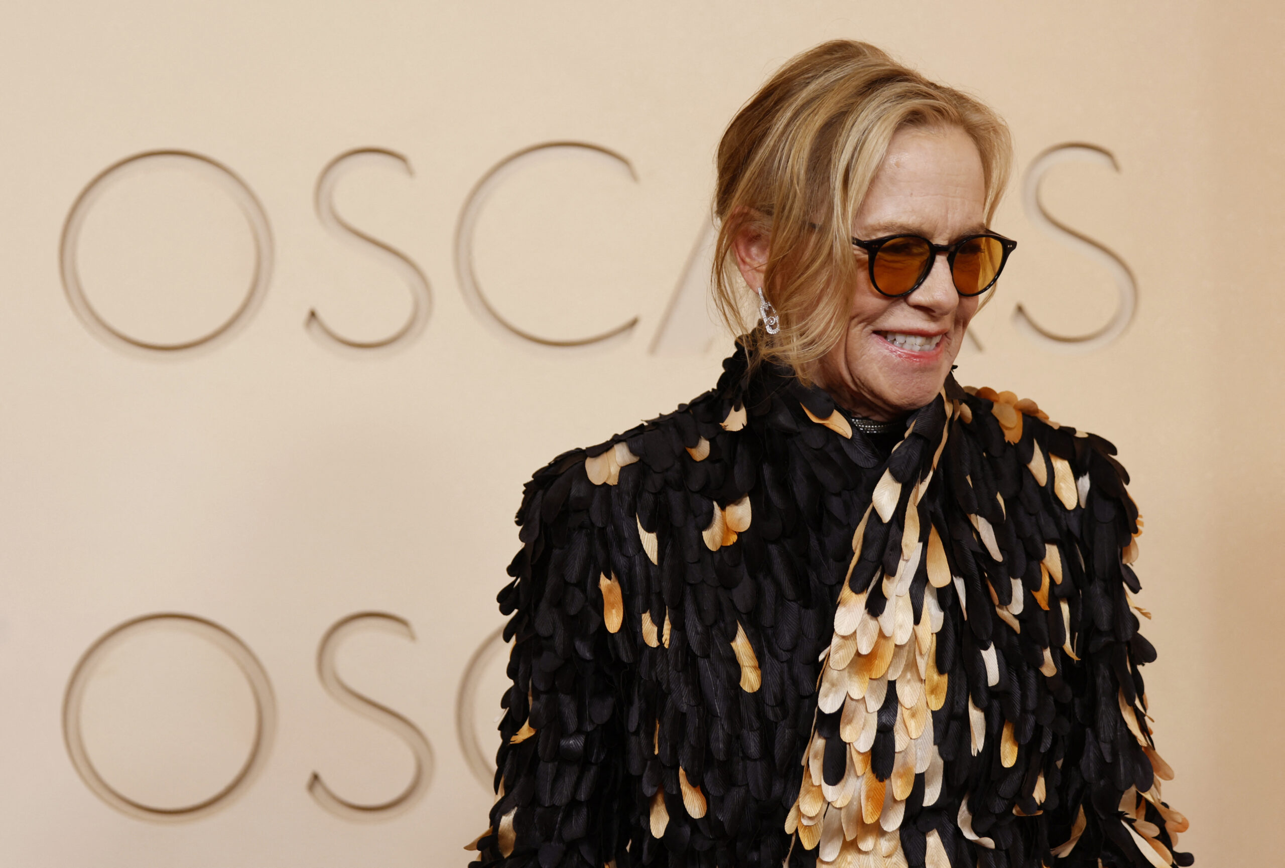 Amy Madigan poses on the red carpet during the Oscars arrivals at the 98th Academy Awards in Hollywood, Los Angeles, California, U.S., March 15, 2026. REUTERS