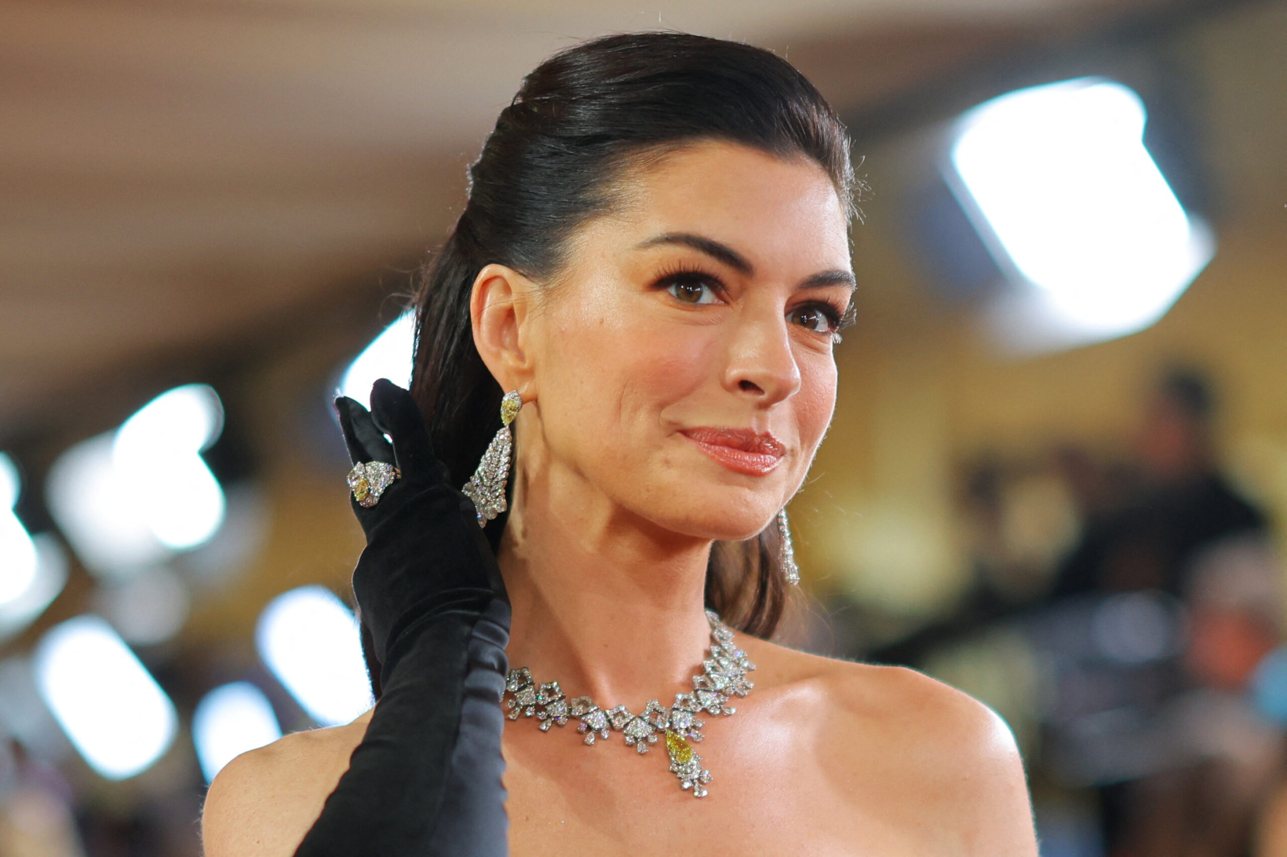 Anne Hathaway poses on the red carpet during the Oscars arrivals at the 98th Academy Awards in Hollywood, Los Angeles, California, U.S., March 15, 2026. REUTERS