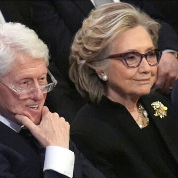 FILE - Former President Bill Clinton and former Secretary of State Hillary Clinton listen during the state funeral for former President Jimmy Carter at Washington National Cathedral in Washington, Jan. 9, 2025. (AP Photo/Jacquelyn Martin, File)