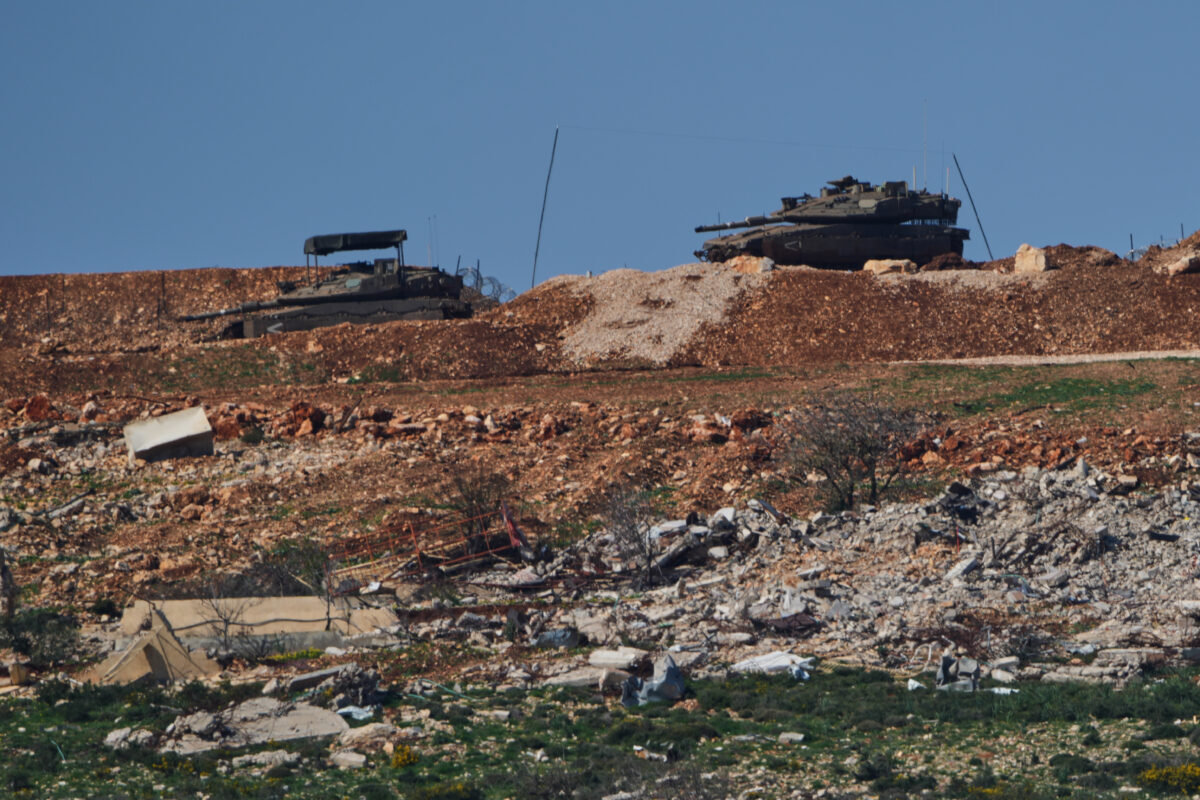 Israeli tanks maneuver near the Israel-Lebanon border, as seen from northern Israel, Monday, March 2, 2026. (AP Photo/Ariel Schalit)