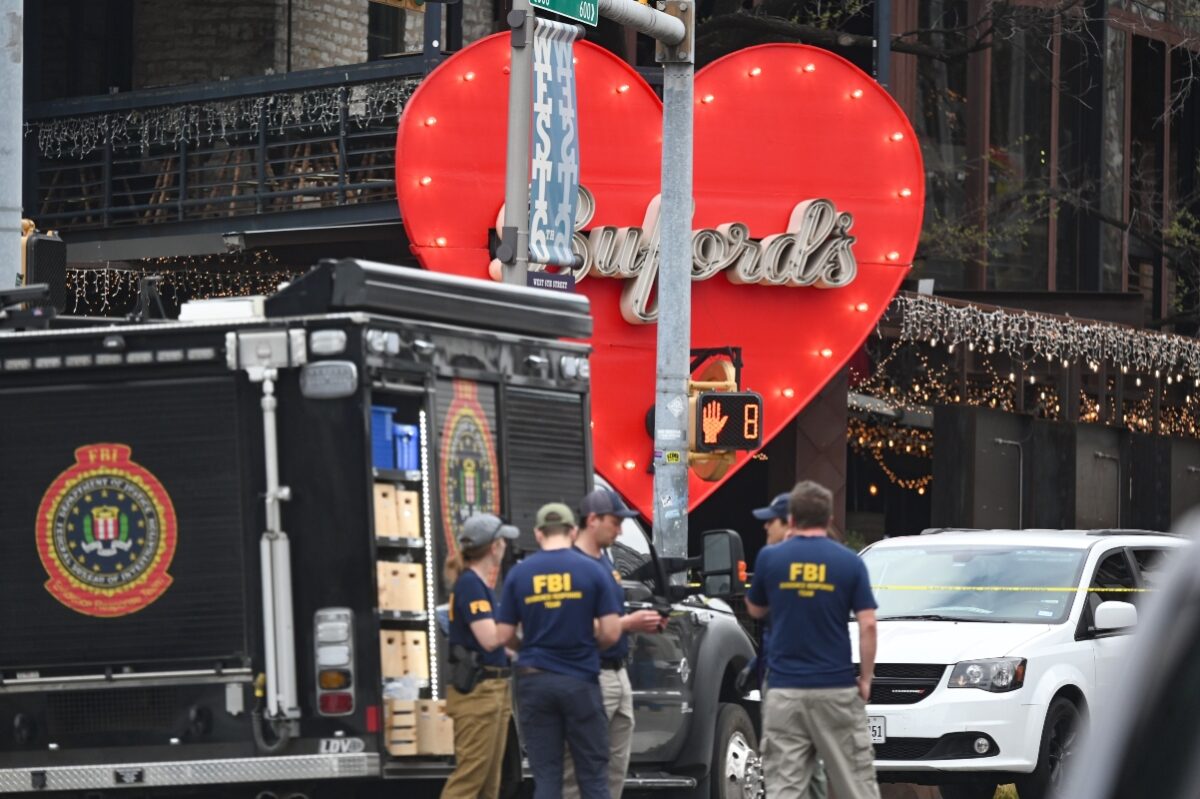 The Austin Police Department and the FBI investigate a shooting at Buford's on 6th Street on Sunday, March 1, 2026, in Austin, Texas.