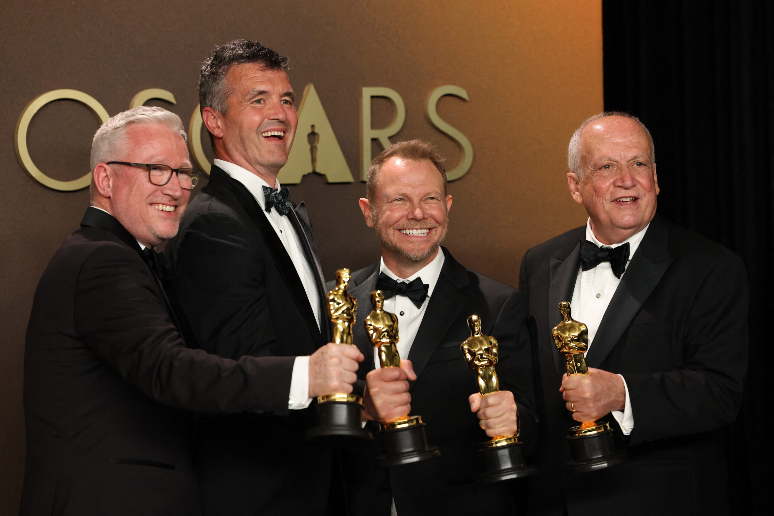 98th Academy Awards – Oscars Photo Room – Hollywood Daniel Barrett, Eric Saindon, Richard Baneham and Joe Letteri pose with their Oscars for Best Visual Effects for