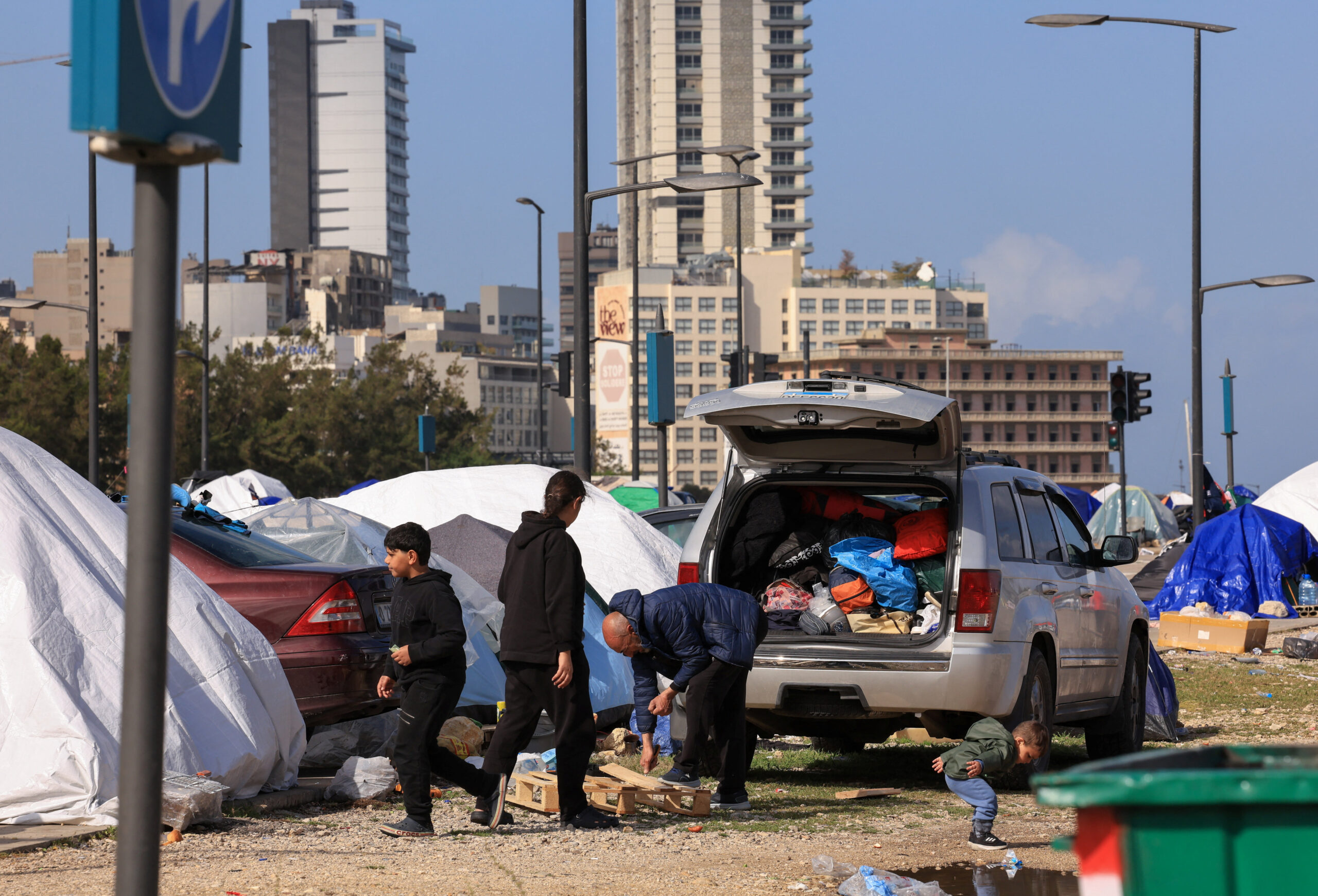 Displaced people outside a car with belongings next to tents, in Beirut Displaced people outside a car with belongings next to tents, following an escalation between Hezbollah and Israel, amid the U.S.-Israeli conflict with Iran, in Beirut, Lebanon, March 16, 2026. REUTERS/Raghed Waked